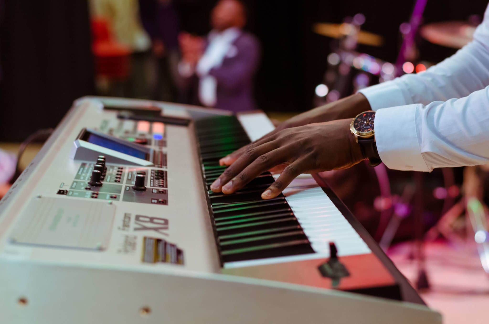 Canva - Photo of a Person Playing Electronic Keyboard