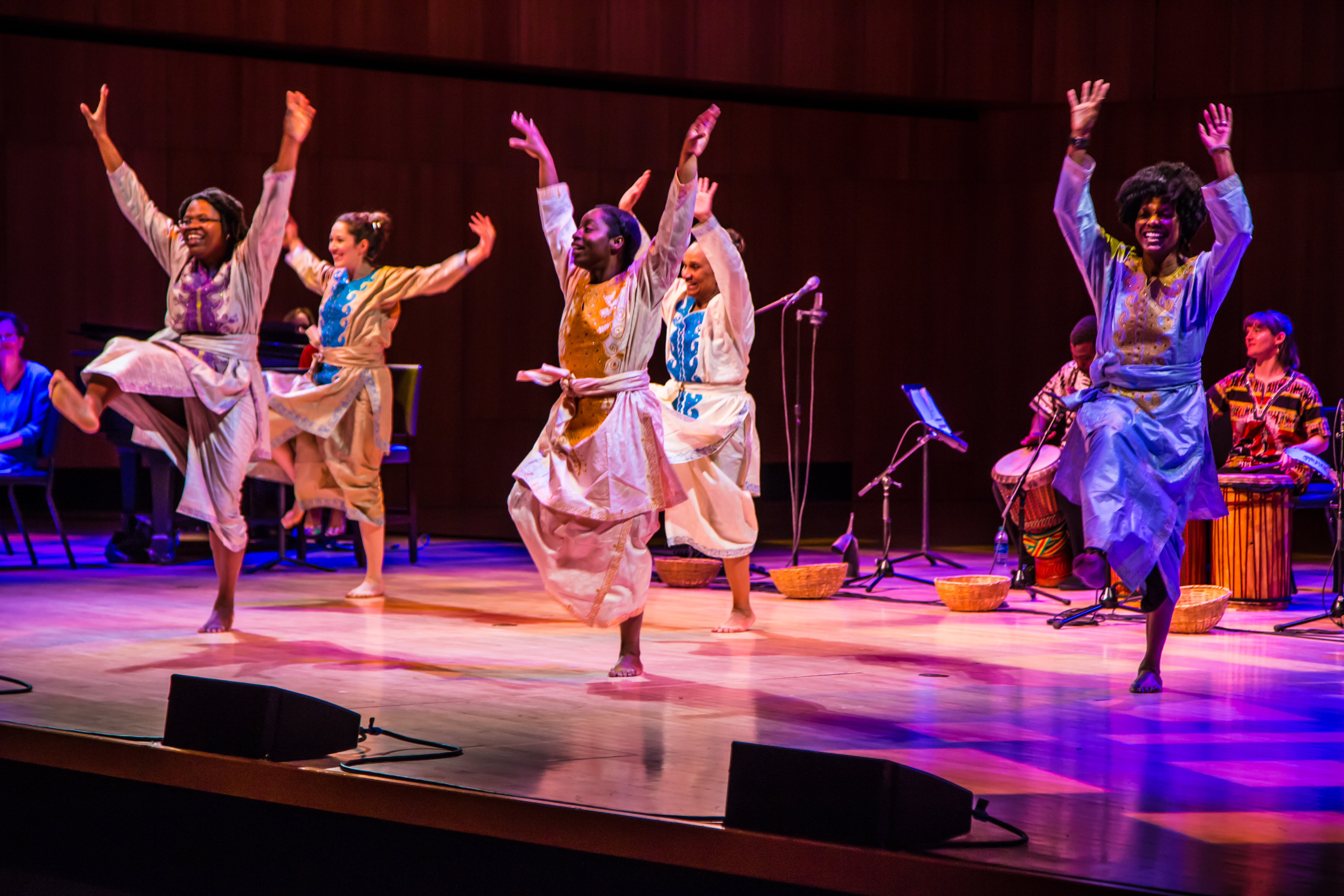 Dancers from the African Culture Connection dance on stage at the Holland Center