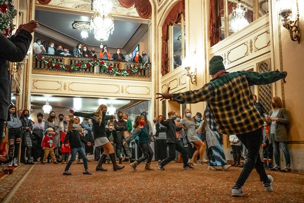 Patrons dance in Orpheum lobby for curtain warmer with Aaron Derrel