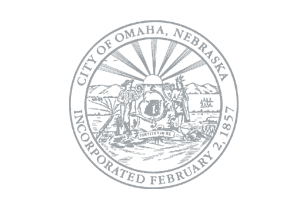 The official circular seal of the City of Omaha featuring an eagle and decorative text around the border.