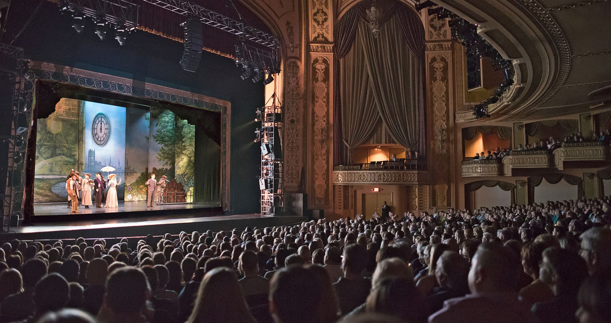 crowd watching broadway show on stage at the orpheum theater